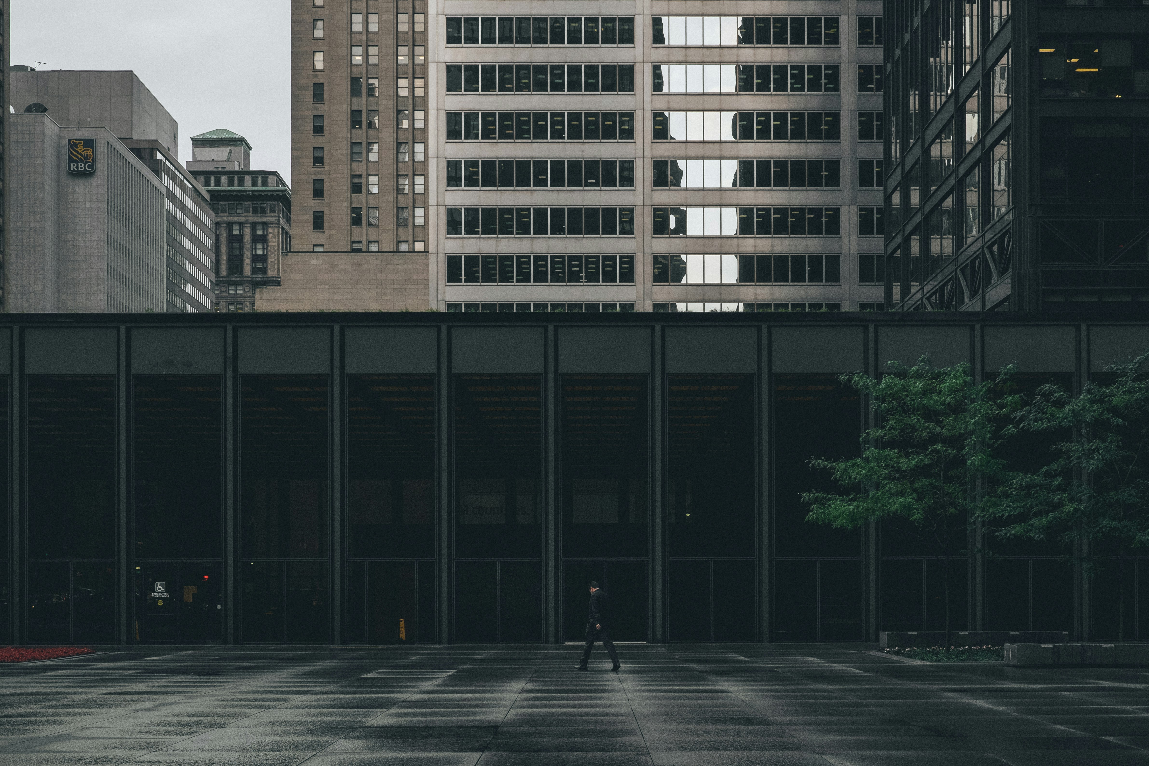 person walking near building during daytime